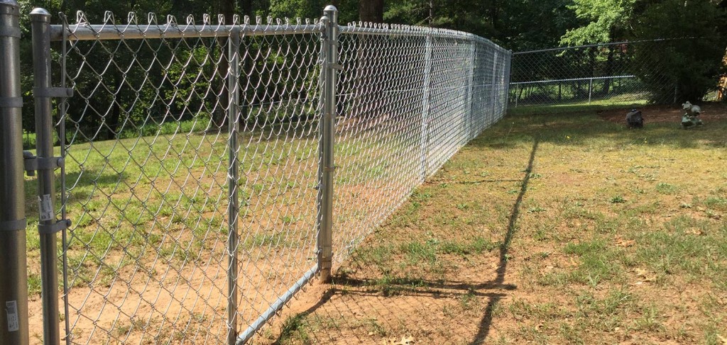 Chain-link fencing by Fence Pro Hickory